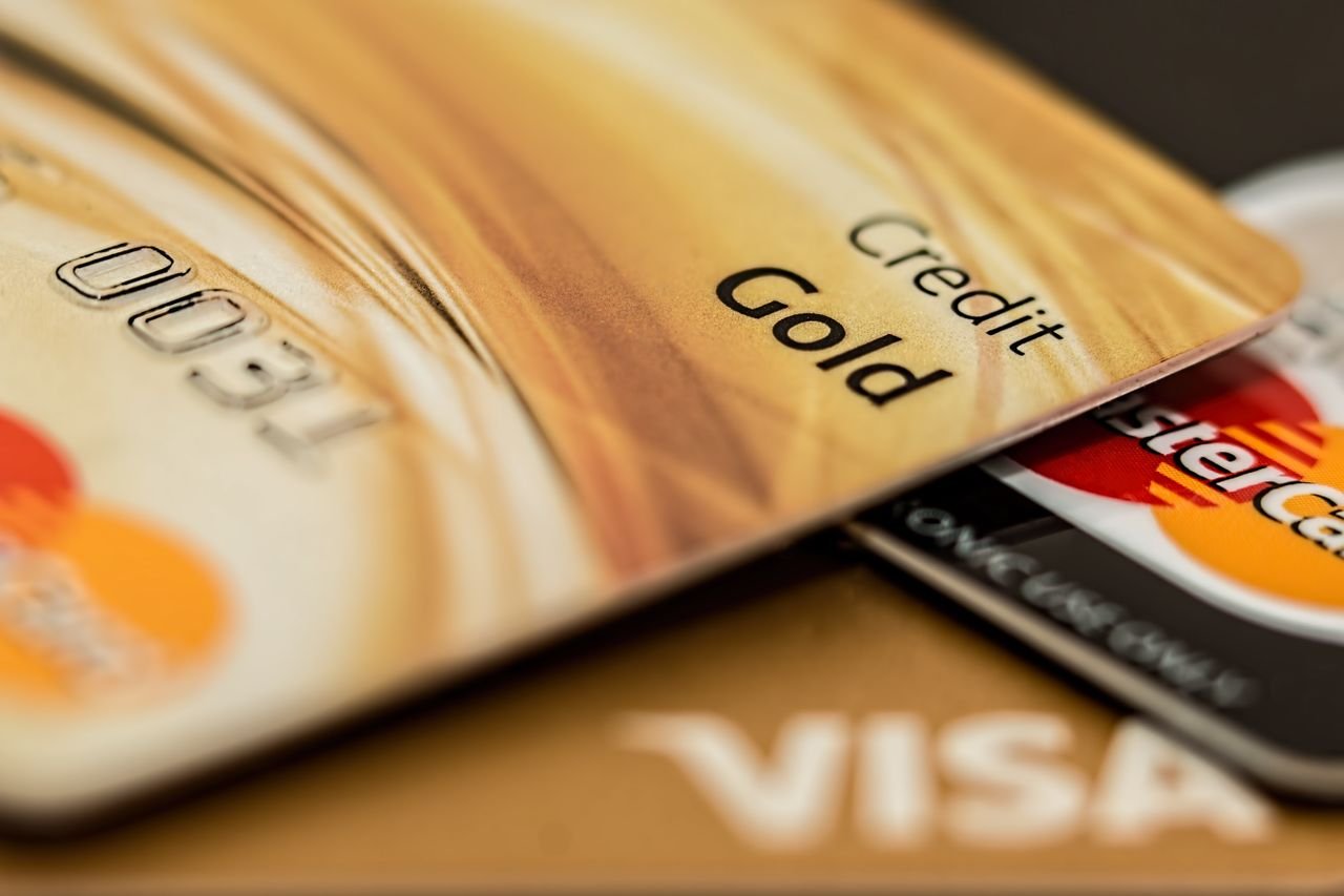 Stack of credit cards showing how long it takes to pay off credit card debt